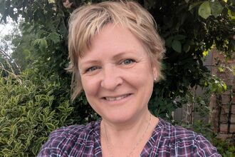 Elaine Pestle, a woman with short blonde hair