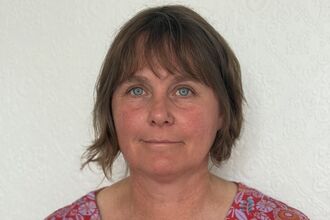 Sonja Seaton, a woman with cropped brown hair